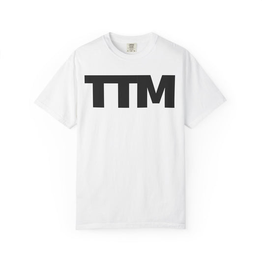 White t-shirt with 'TTM' printed on it against a white background